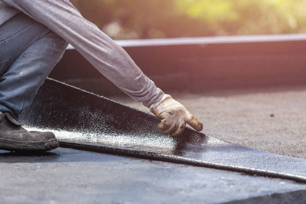 Professional Basement Waterproofing technician working in Austin, MN